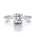 Elegant silver ring with round brilliant cut center stone and pavé set side diamonds - US 7 / White Stone