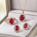 Set gioielli eleganti in oro rosa con pietre preziose ovali rosse in cofanetto - Set di Pietra Rossa