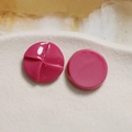 Close-up of rose red resin windmill ornaments with spiral and smooth surface textures - Rose Red