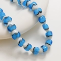 Vue macro des perles en verre rayées de 15 mm en forme de cœur pour bijoux - 119# Bleu Ciel (Pièce Unique)