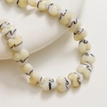Vue macro de perles en verre en forme de cœur de 15mm avec motifs spirales pour bijoux DIY - 118# Beige (Pièce Unique)