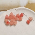 Macro shot of translucent pink tulip beads for DIY jewelry making on a ceramic tray - Tulip Flower Bud (14#) / 1 Piece / Pink Jade