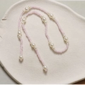 Detailed view of pink transparent beads and white pearls chain for DIY shoe decoration - Soft Pink