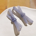 Paire de barrettes à cheveux nœud en acétate lilas marbré sur fond céramique - Gris