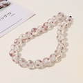 Macro view of clear rainbow polka dot glass beads with pink interior for DIY crafts - White And Brown Polka Dot Ball (18)