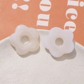 Macro view of cream-colored resin five-petal flower DIY beads with center hole - Cream White (72#)