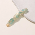 Detailed macro view of acetate hair clip featuring blue and beige marble texture with gold glitter - 2# Champagne Green