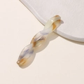 Detail of twisted acetate hair clip featuring cream and amber marble texture finish - 3# Coffee Purple