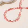 Detailed view of pink translucent strawberry quartz beads for jewelry making - Flat Bead (21#) / 1 Piece / Pink