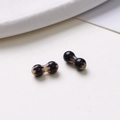 Macro shot of 8mm oval glass beads with purple-black finish and white dots for DIY jewelry - Style 23 (23#) / 1 Piece/Pack