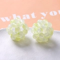 Close-up of handmade 32mm light green translucent woven bead spheres for DIY jewelry - Light Green (A5-2 #8)