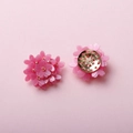 Pink handmade woven floral earring accessory with layered petals and gold center beads - Rose Red