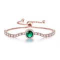 Detailed macro of rose gold adjustable bracelet with round green gem and zircon pavé stones - Rose Gold Green Stone
