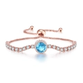 Detail of rose gold bolo bracelet with blue stone halo and adjustable box chain - Rose Gold Sea Blue Stone