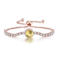 Close-up of adjustable rose gold bracelet with yellow gemstone and white zircon stones - Rose Gold Yellow Stone