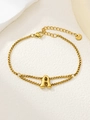 Detail van de dubbellaagse vergulde roestvrijstalen schakelarmband met letter A hanger - Goud A