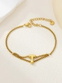 Detail van de dubbellaagse gouden roestvrijstalen armband met gepolijste letter T-hanger - Goud T