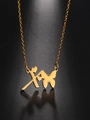 Golden stainless steel butterfly necklace with heart pendant on a black textured surface - Gold Letter X