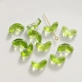 Detailed view of translucent green glass tulip leaf beads for DIY bracelet making - Leaf / 1 Piece (14x6mm) / Green