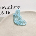 Macro shot of light blue acetate hollow butterfly pendant for DIY jewelry making - Right Wing / Blue