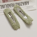 Detail of light green lace rectangular BB hair clips with textured mesh and silver metal clasps - Green