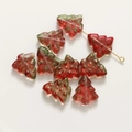 Macro detail of red 3D Christmas tree glass beads with gold pins for DIY jewelry making - 1 Piece / Red and Green