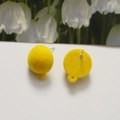 Detailed view of yellow flocked stud earrings showing the texture and back hanging loop - Bright Yellow