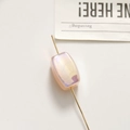Macro shot of iridescent rectangular beads with shimmer finish on golden metal pins - 1 Piece (18*11mm) / Pink