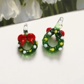 Close-up of green glass Christmas wreath charms with red bows and festive details - Christmas Round Wreath Style (Style 1 - 1pc)