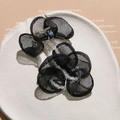 Elegant black tulle flower hair accessory with crystal beads and long tassel accents - Black