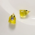 Close-up of yellow resin ghost charms with purple star and golden ring for DIY jewelry - Yellow + Purple Star