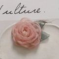 Elegant layered pink mesh camellia flower accessory with green leaves and white stamens - Pink