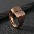 Polished rose gold stainless steel signet ring with smooth flat top on black stone - Size 6 / Heart / Rose Gold