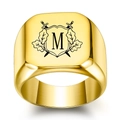 Polished gold signet ring featuring engraved letter M with crossed swords crest - M