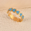 Adjustable golden ring featuring blue enamel heart patterns in a minimalist style - Full Circle Heart Blue Gold Style (k-13)