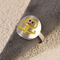 Minimalist silver-tone stainless steel ring with a yellow smiley face on grey velvet stand - Funny Character Yellow Style (k-25)