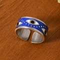 Vintage evil eye open ring with blue enamel and silver plating on wood background - Evil Eye Silver Style (K-42)