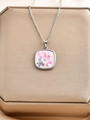 Collana oceano in argento con ciondolo a tartaruga e perla su espositore dorato - Tartaruga d'Argento
