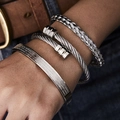 Detailed macro view of three-piece silver men's stainless steel woven bracelet set - Inscription Combination Set (3-Piece) / Silver