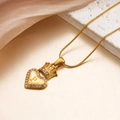 Golden necklace with heart-shaped pendant featuring crown detail and letter P engraving - Letter P
