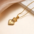 Golden crown heart necklace featuring letter S pendant with sparkling crystal inlay - S