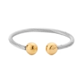 Minimalist silver steel cable open bangle with golden spherical ends on a white background - Steel Cable Gold Tips