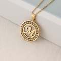 Gold-plated stainless steel round pendant necklace with M letter and crystal inlay - M