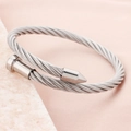 Silver stainless steel twisted cable bangle with industrial nail ends and open clasp design - Steel
