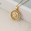 Golden stainless steel necklace with a round sparkling pendant featuring letter H - Letter H