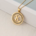 Gold plated stainless steel necklace featuring a crystal-encrusted round letter K pendant - Letter K