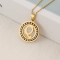 Gold stainless steel necklace featuring a crystal-encrusted round pendant with letter Q - Letter Q
