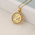 Gold stainless steel necklace with crystal-set round pendant featuring letter Z charm - Letter Z