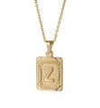 Vue macro d'un pendentif rectangulaire plaqué or 18K avec textures radiales et lettre Z - Style Lettre Z Dorée (Z)