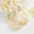 Macro detail of natural irregular pale yellow and cream stone beads for DIY jewelry making - Approx 270 Pcs/Strand / Creamy Yellow (0801)